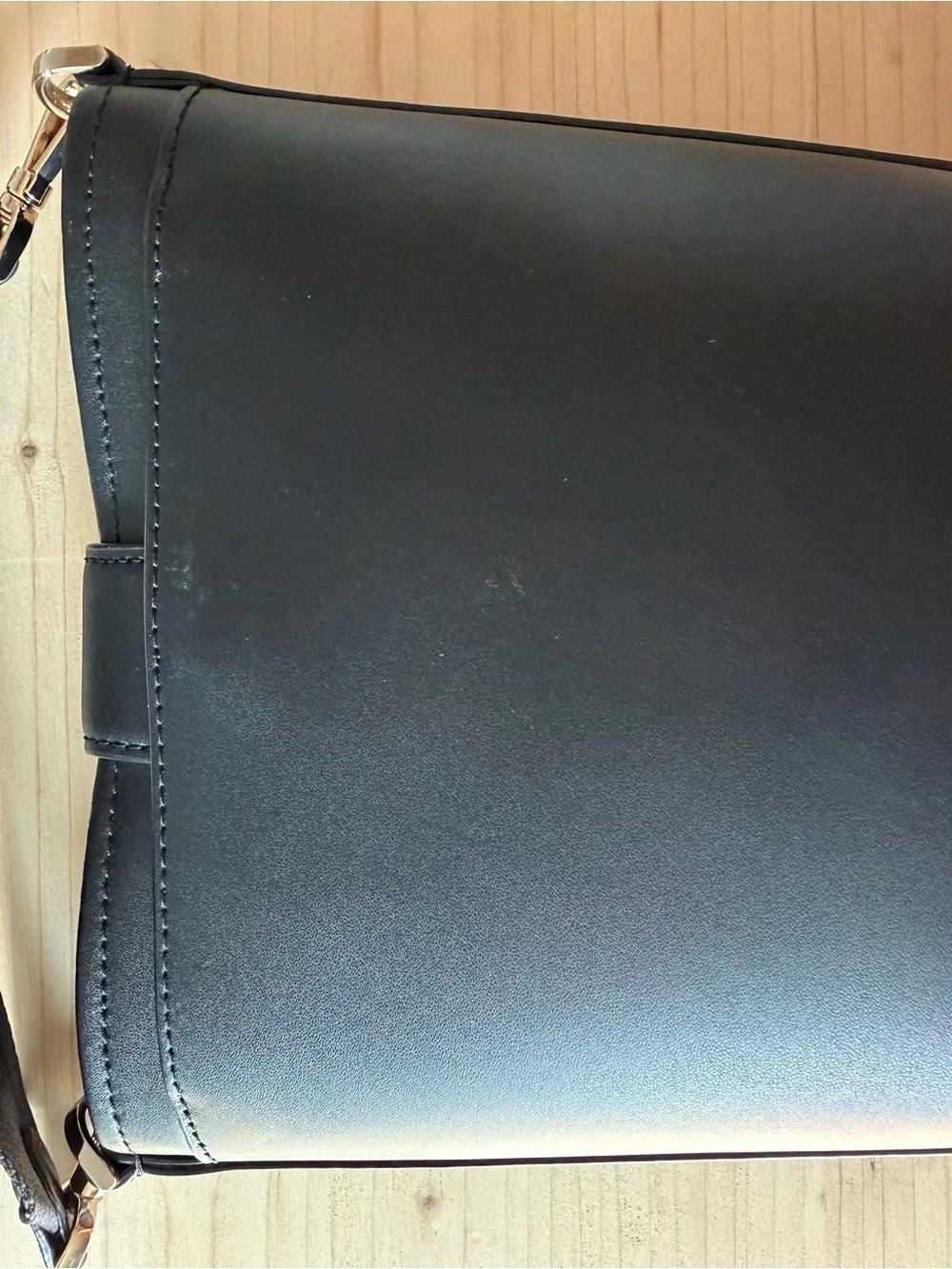 kate spade Black Leather Bucket Crossbody with Gold Medallion